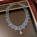 Close-up of vintage blue glass beaded lace necklace with sparkling crystal drop - Necklace-Grey