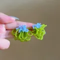 Handmade beaded flower earrings in light blue and green tones with woven leaf detail - Style 1 / Silver Earring Post-Green