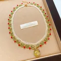 Vintage handmade lace glass beaded necklace in green and red with floral pendant - Olive Green