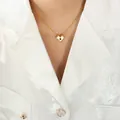 Collana a cuore dorata con intarsio in conchiglia bianca e cristallo nero lucido - Oro