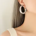 Silver twisted rope hoop earrings in a minimalist bold style for women's jewelry - Steel