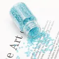Light blue silver-lined glass seed beads in a clear bottle for DIY jewelry making - Lake Blue