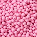 Perles en acrylique rose 6mm avec trou central pour la création de bijoux et bracelets - Rose