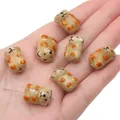 Perlina in ceramica a forma di cane dipinta a mano con macchie arancioni per gioielli - Orso Caffè / 13x19mm