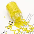 Yellow seed beads in a plastic bottle for DIY jewelry making and beadwork crafts - Solid Yellow