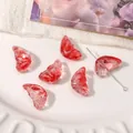 Translucent red glass wing beads for DIY jewelry making displayed on a white tray - 11x20mm (10 Pieces/Pack) / Transparent Red