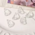 Transparent glass wing-shaped beads for DIY jewelry making on white ceramic plate - 11x20mm (10 Pieces/Pack) / Transparent White