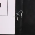 Silver-plated DIY fishhook earrings set with bead and loop on a black satin background - 20x22mm (100 Pieces/Pack) / Silver