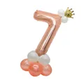 Detail of rose gold number 7 balloon with golden crown and pink latex base pillar - Number 7 Rose Gold Column