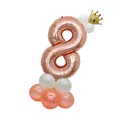 Detail of rose gold number 8 balloon with golden crown and pink latex base for party - Number 8 Rose Gold Column