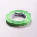 Grass green floral tape roll with paper core for DIY flower arrangements and crafts - Green