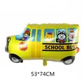 Detail view of yellow school bus foil balloon with cartoon animals for kids party - School Bus