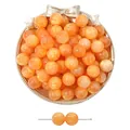 Vibrant orange resin beads with cat-eye swirl texture for DIY jewelry making - Orange