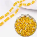 Cuentas de vidrio de cristal facetado de 6mm amarillo y blanco para bisutería - 100 Piezas/Paquete (Diámetro 6mm) / Serie Amarilla