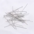 Macro view of silver flat head pins for handmade jewelry DIY accessories on white fabric - 0.7x20mm (50 Pcs/Pack) / White Gold