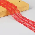 Vibrant red 4cm polyester lace ribbon featuring hollow floral patterns for DIY sewing crafts - Red