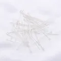 Macro view of bright silver eye pins for jewelry making and DIY beaded earrings - 0.7x20mm (50 Pcs/Pack) / Thick Silver
