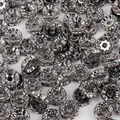 Cuentas espaciadoras de metal negro con cristales para la creación de joyería - Diámetro 4mm / Negro pistola con diamantes de imitación blancos