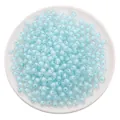Light blue translucent acrylic beads for DIY jewelry making in a white display tray - Transparent Blue Round Beads