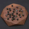 Faceted black crystal glass waterdrop and round beads displayed on walnut wood board - 10 Pieces/Pack (9x8mm) / Black