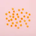 Handgefertigte orangefarbene Glasperlen in Blütenform für DIY Schmuck und Armbänder - 1 Strang (ca. 37-45 Stück, Durchmesser 4-5mm) / Orange