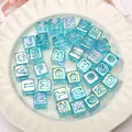 Transparent light blue ice-cube alphabet beads with silver letters for DIY crafts - 12x12mm (10 Pieces/Pack - Random Letters) / Lake Blue