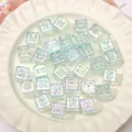 Holographic ice cube alphabet square beads in a white ceramic dish for DIY jewelry - 12x12mm (10 Pieces/Pack - Random Letters) / Light Lake Blue