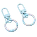 Light blue donut spring alloy keychain with colorful polka dots, pack of two pieces - Total length approx 52mm Door buckle size 12x32mm Spring buckle outer diameter 24mm Thickness approx 3mm / 1 Piece / Blue