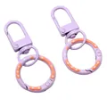 Lavender purple donut alloy spring ring keychain with white polka dots for DIY craft projects - Total length approx 52mm Door buckle size 12x32mm Spring buckle outer diameter 24mm Thickness approx 3mm / 1 Piece / Purple