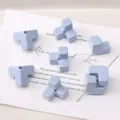 Light blue block beads for DIY crafts with puzzle shapes and soft glossy finish - Blue