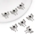 Set mit sieben silbernen Schleifenanhängern mit schwarzen Herzen und Strasssteinen - Schleifen-Stil (Schwarzer Stein/Nur Anhänger) / 1 Stück/Packung (18x18mm) / Silber