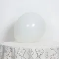 Detail of 10-inch matte latex white balloon with lace fabric for elegant party decor - Matte White