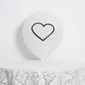 Close-up of a white latex balloon featuring a minimalist black heart outline design - White Heart Print