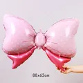 Ballon en aluminium en forme de nœud rose à pois de 88x62cm pour décor de fête - Grand Nœud / Rose