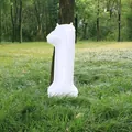 32-inch white number 1 foil balloon for baby birthday party decoration on green grass - Number 1