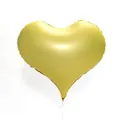 Detail of 22-inch matte metallic gold heart-shaped foil balloon with ribbon attachment - Macaron Yellow