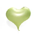 Detail view of heart-shaped sage green matte balloon with white ribbon for party decor - Macaron Green
