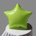 Dettaglio di un palloncino in alluminio verde macaron a stella per decorazioni di festa - 18 Pollici Macaron Verde Stella