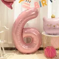 Detail of 40-inch pearlescent pink number 6 foil balloon for birthday party decorations - Number 6