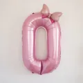 Ballon chiffre 0 rose en aluminium avec nœud à pois pour décoration d'anniversaire - Chiffre 0