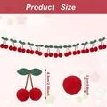 Detalle de guirnalda de cerezas con pompones mostrando altura 6,5cm y diámetro 2,5cm - Rojo