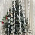 Detail of white star Christmas tree foil curtain decor with festive holiday background - Silver Pine Tree