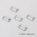 Close-up of 5x10mm clear rectangle sew-on acrylic rhinestones with two holes, 200pcs - 5x10mm (200 Pieces/Pack) / Clear White