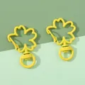 Pair of yellow clover shaped alloy lobster clasps with rotating rings for DIY jewelry - Yellow