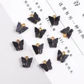 Pendentif papillon en résine marbrée noire et alliage doré pour bijoux faits main - Noir