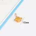 Starry sky Saturn charm in golden alloy with yellow enamel finish for DIY jewelry - 10 Pieces Pack / Yellow