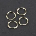 Set of four gold-plated twisted alloy rings for DIY earring and jewelry making - Set of 4 / Approx. 17mm / Gold