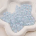Frosted light blue acrylic beads in a star-shaped ceramic tray for DIY jewelry - 8mm (50pcs/Pack) / Matte Blue