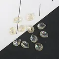 Irisierende AB-Muschel-Blütenblatt-Anhänger für DIY-Schmuck und Haarschmuckzubehör - Lochdurchmesser ca. 1,5 mm (20 Stk./Packung) / Klein Schillernd Gelb