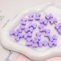 DIY lila Acrylperlen in Schleifenform mit horizontalen Löchern für Bastelschmuck - Lila